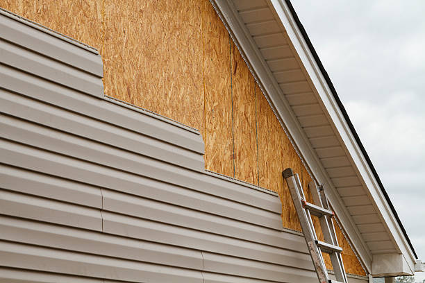 Professional Siding Contractor technician working in Newark, NJ